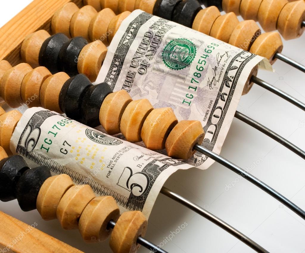 dollar banknote in wooden abacus