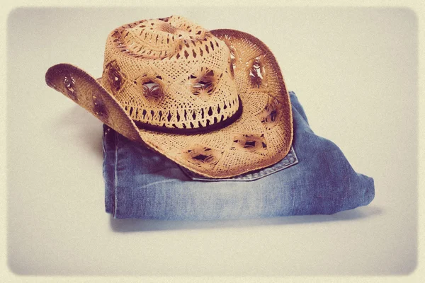 Cowboy jeans and hat — Stock Photo, Image