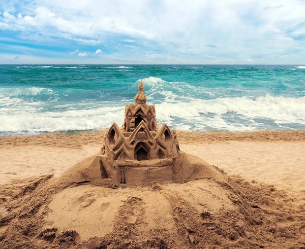 Sand castle on beach — Stock Photo, Image