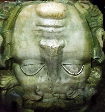Medusa head shown in the Basilica Cistern in Istanbul, Turkey. clipart