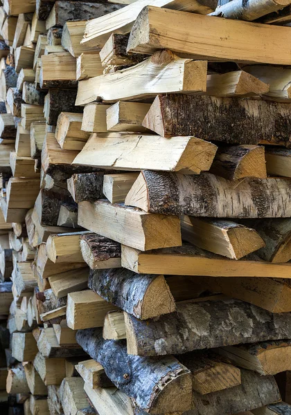 Chopped firewood logs in a pile — Stock Photo, Image