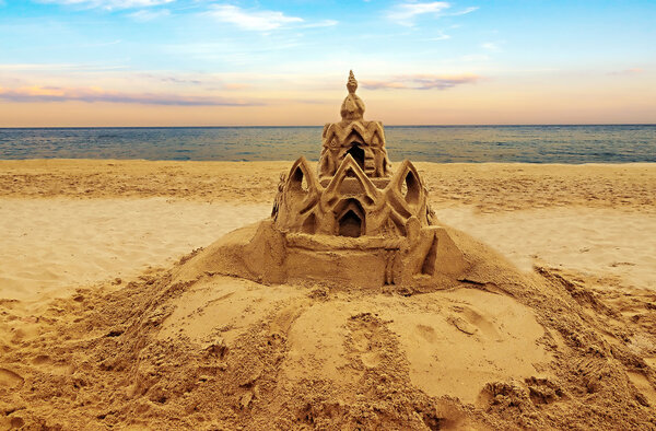 Sand castle on beach