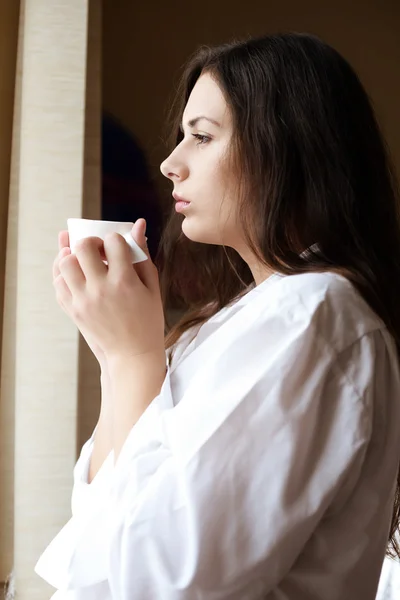 Morning coffee near the window — Stock Photo, Image