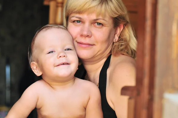 Mature mother with baby — Stock Photo, Image