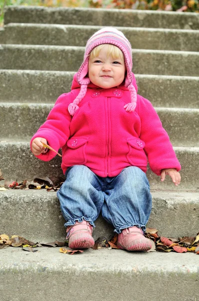 Baby girl making funny face — Stock Photo, Image