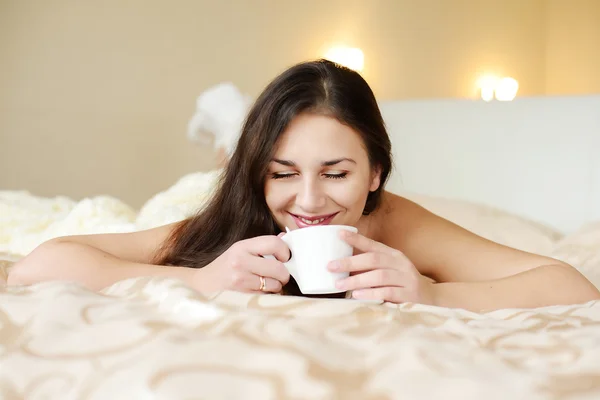 Brunette enjoying coffee — Stock Photo, Image
