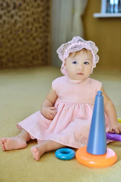 Baby girl with toy — Stock Photo, Image