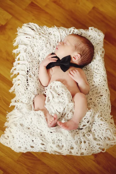 Newborn in basket — Stock Photo, Image