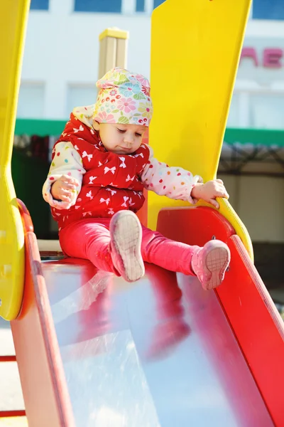 Cute toddler on slide — Stock Photo, Image