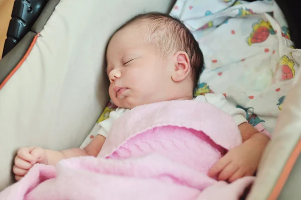 Newborn in pram — Stock Photo, Image