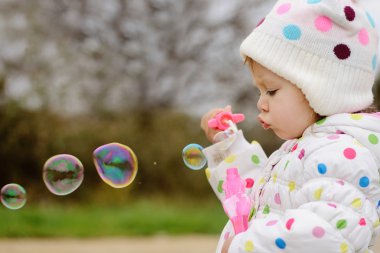 girl with soap bubbles clipart