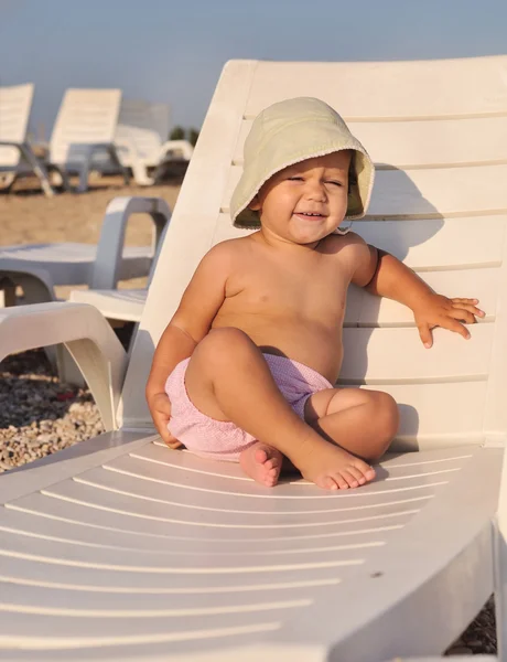 Baby on sun lounger — Stock Photo, Image