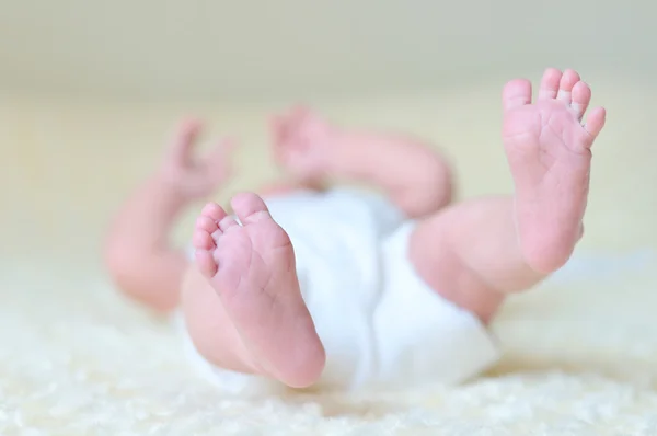 Newborn's feet — Stock Photo, Image