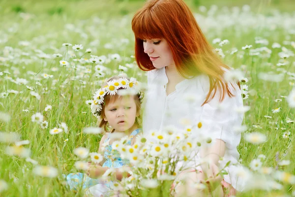 Familie in diende — Stockfoto