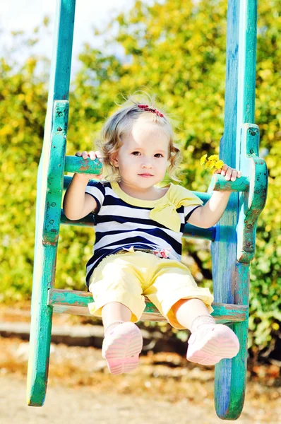 Swinging toddler — Stock Photo, Image