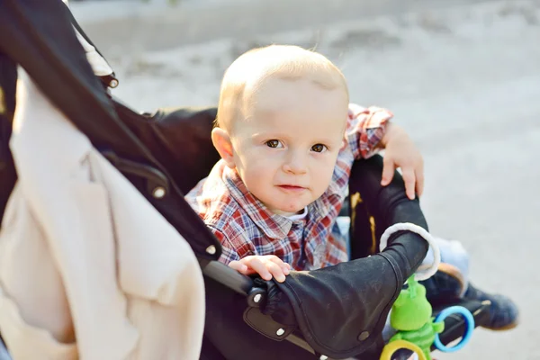 Baby boy in buggy — Stock Photo, Image