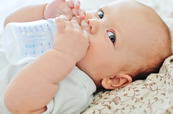 Drinking baby — Stock Photo, Image