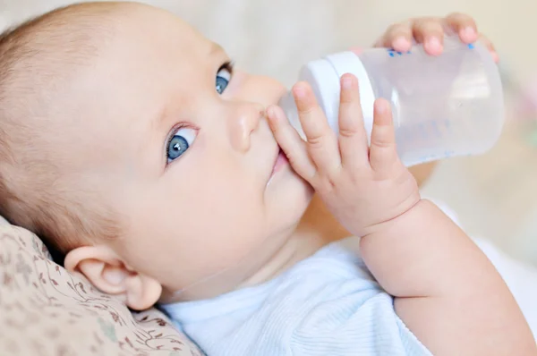 Baby with water — Stock Photo, Image