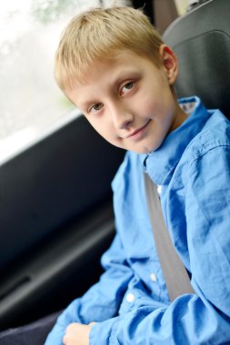 Boy in car