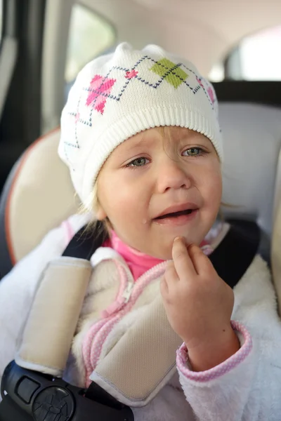 Girl crying in car — Stock Photo, Image