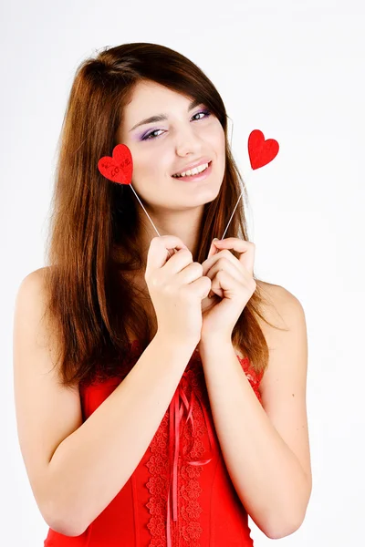 Menina adolescente feliz com corações — Fotografia de Stock