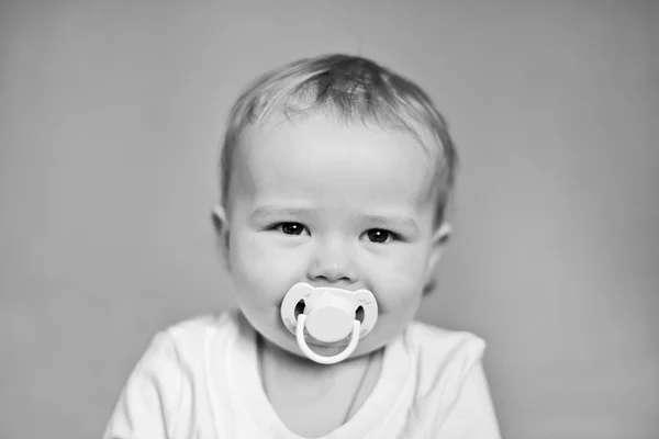 Baby with pacifier — Stock Photo, Image