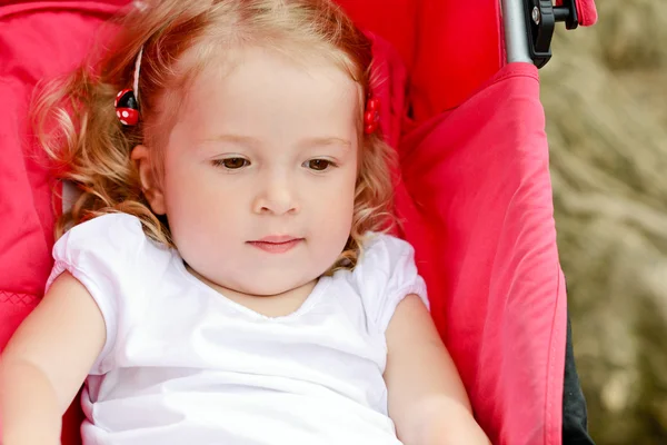 Toddler in stroller — Stock Photo, Image