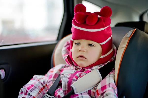 Baby girl in car seat — Stock Photo, Image