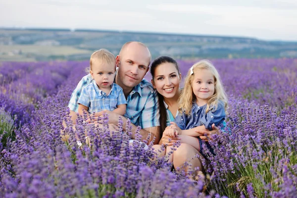 Family in lavender field — Stock Photo, Image