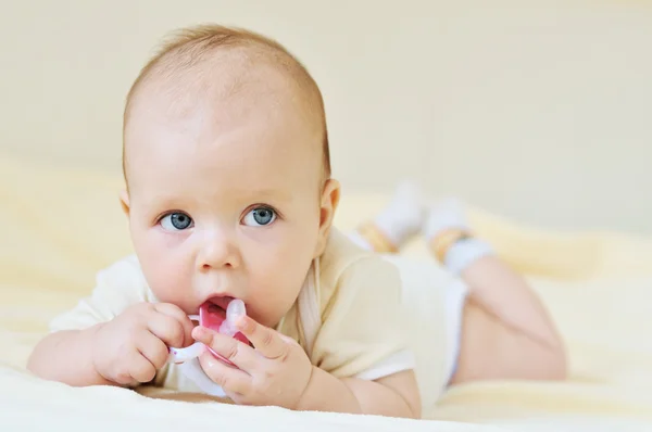 Baby with dummy — Stock Photo, Image