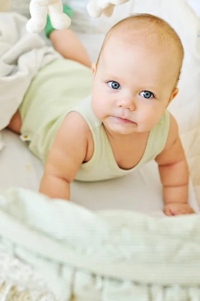 Baby in crib — Stock Photo, Image