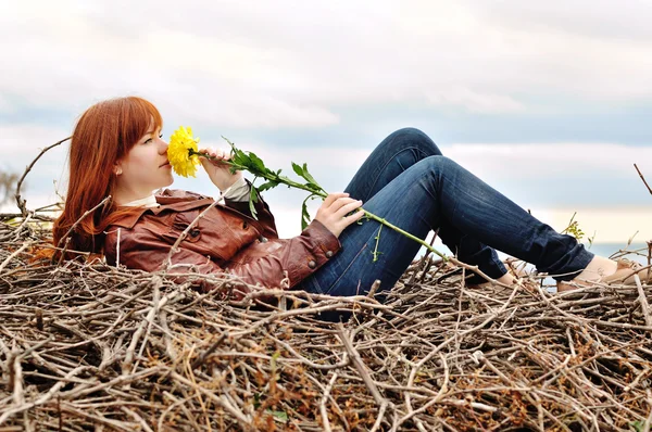 Girl with autumn flower — Stock Photo, Image