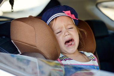 child crying in car clipart
