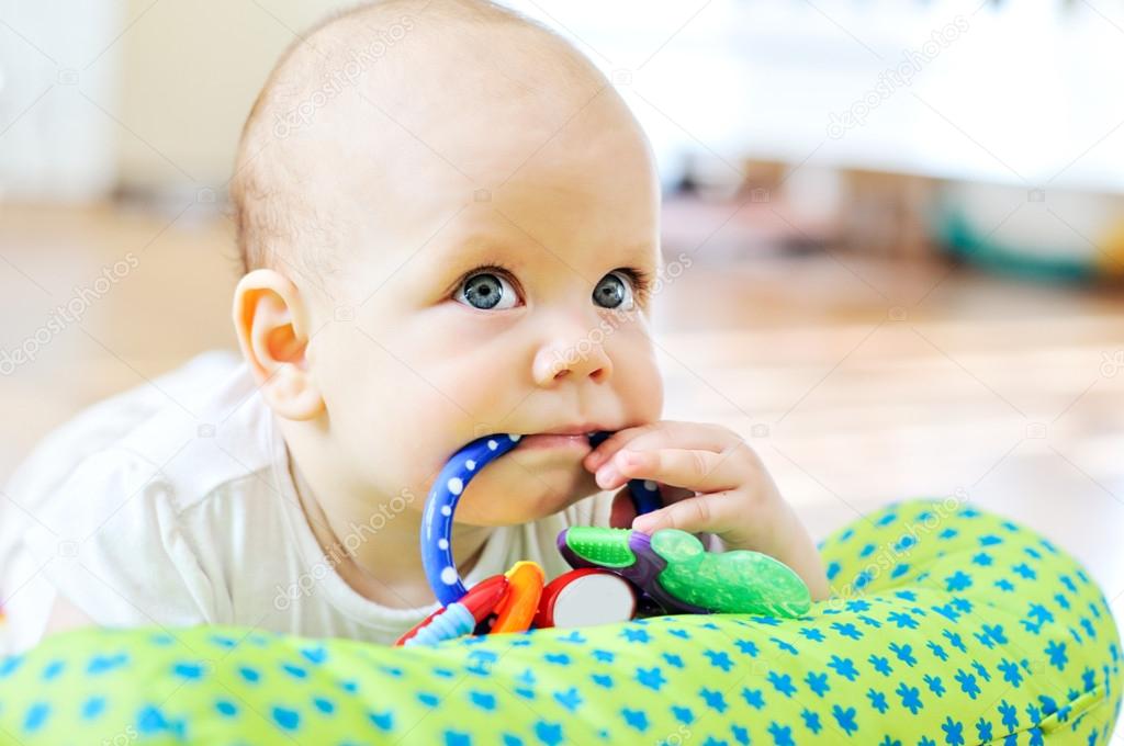 baby with toy  