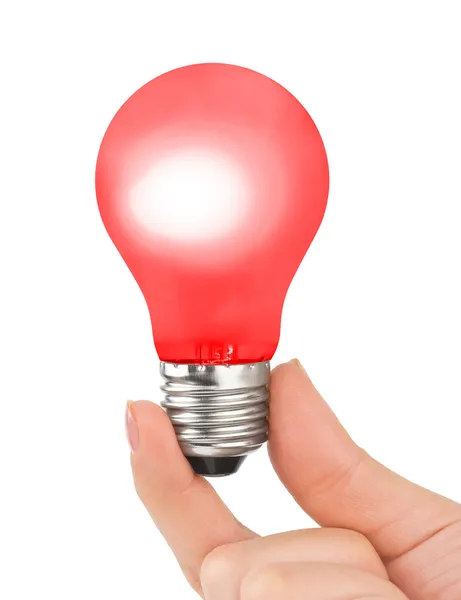 Hand with red lamp — Stock Photo, Image