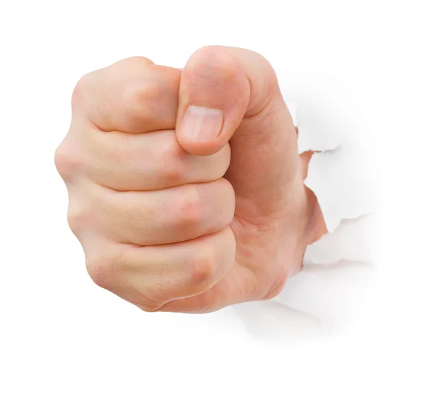 Fist punching paper Royalty Free Stock Images