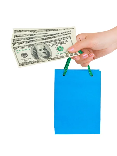 Hand med pengar shopping väska — Stockfoto
