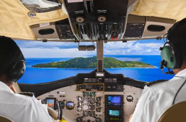 Pilots in the plane cockpit and island