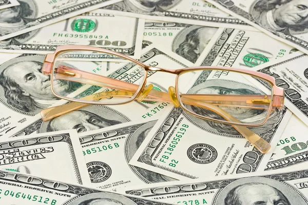 Glasses on money — Stock Photo, Image