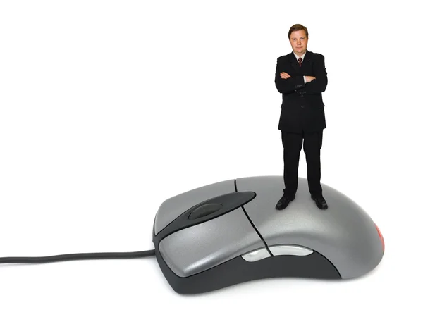 Бизнесмен на компьютерной мыши — стоковое фото