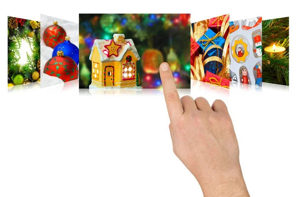 Hand scrolling christmas images — Stock Photo, Image