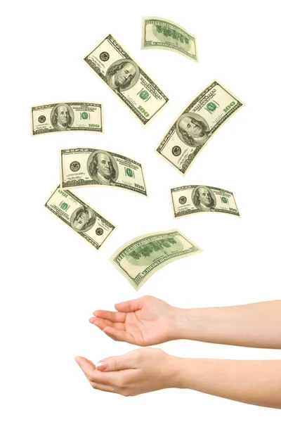 Hands and falling money — Stock Photo, Image