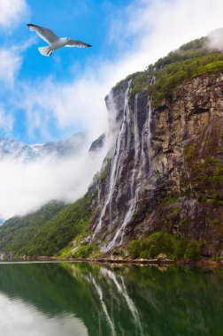 Waterfall in Geiranger fjord Norway clipart
