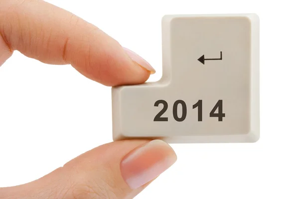 Computer button 2014 in hand — Stock Photo, Image