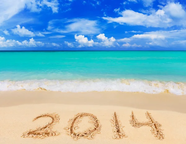 Numbers 2014 on beach — Stock Photo, Image