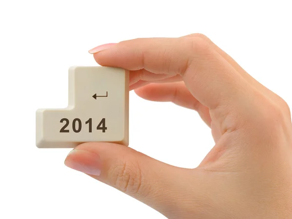 Počítač tlačítko 2014 v ruce — Stock fotografie
