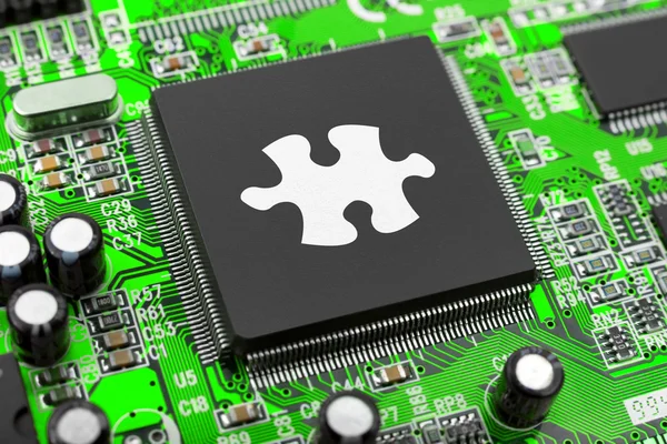 Puzzle on computer chip — Stock Photo, Image