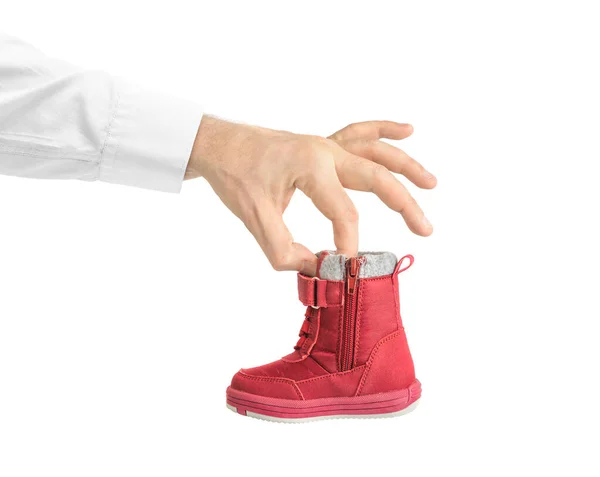 Mano Con Zapato Niño Aislado Sobre Fondo Blanco — Foto de Stock