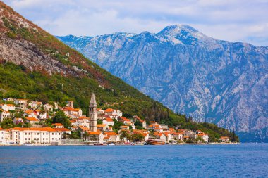 Village Perast on coast of Boka Kotor bay - Montenegro - nature and architecture background clipart