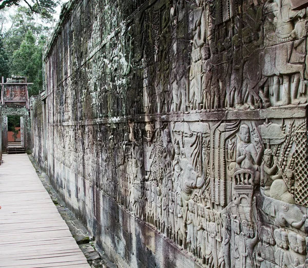 Bayon Temple tallado en pared de piedra. Angkor, Siem Reap, Camboya . —  Fotos de Stock